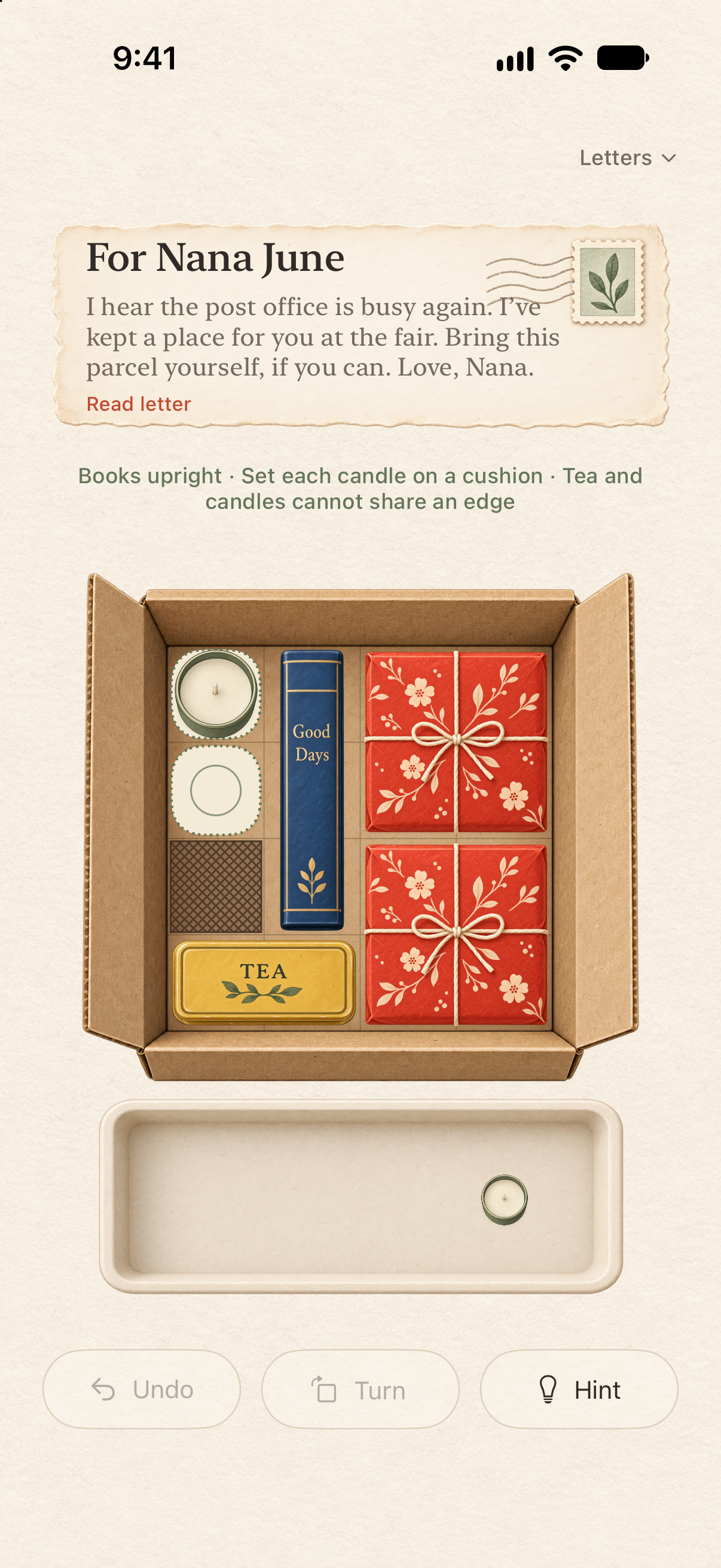 Willow Post on iPhone, showing a letter, arranged objects and puzzle controls